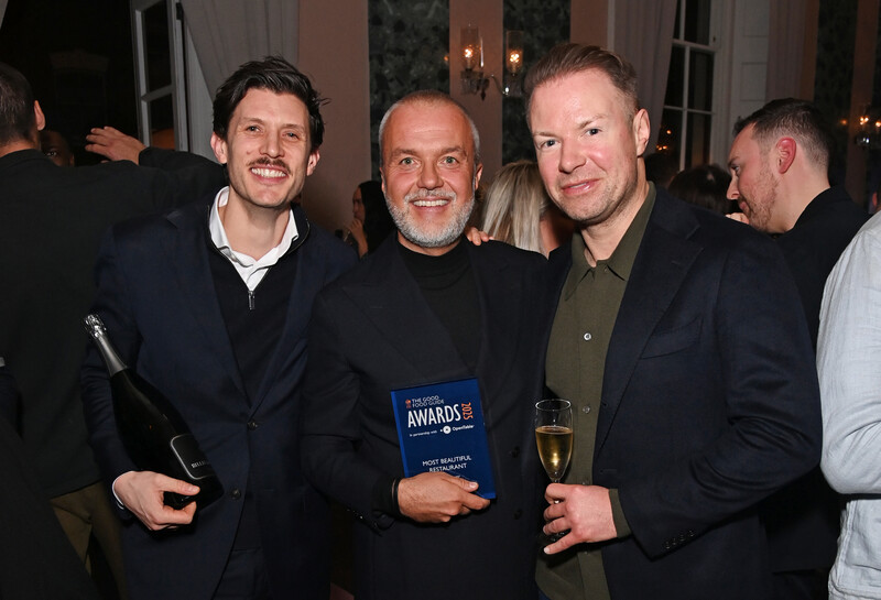 Tobias Smithson, Martin Kuczmarski showing off their Most Beautiful Restaurant Award for The Dover with Emyr Thomas.